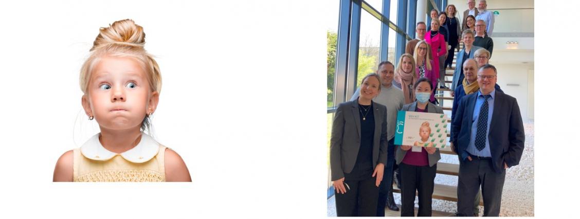 GC MIH network KInd mit aufgepusteten Backen und Leute auf der Treppe
